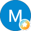 M B